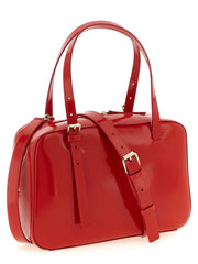 Profilo laterale della borsa in pelle A.P.C. che mette in mostra il design con pieghe sottili e la precisa cucitura tono su tono.