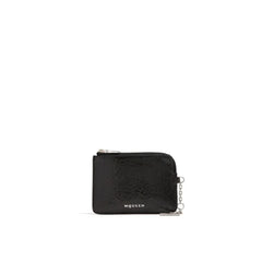 Front view of the Alexander McQueen black calfskin clutch bag featuring a minimalist rectangular silhouette.