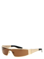 Close-up of Alexander McQueen sunglasses showing the intricate multicolor pattern and refined acetate texture.