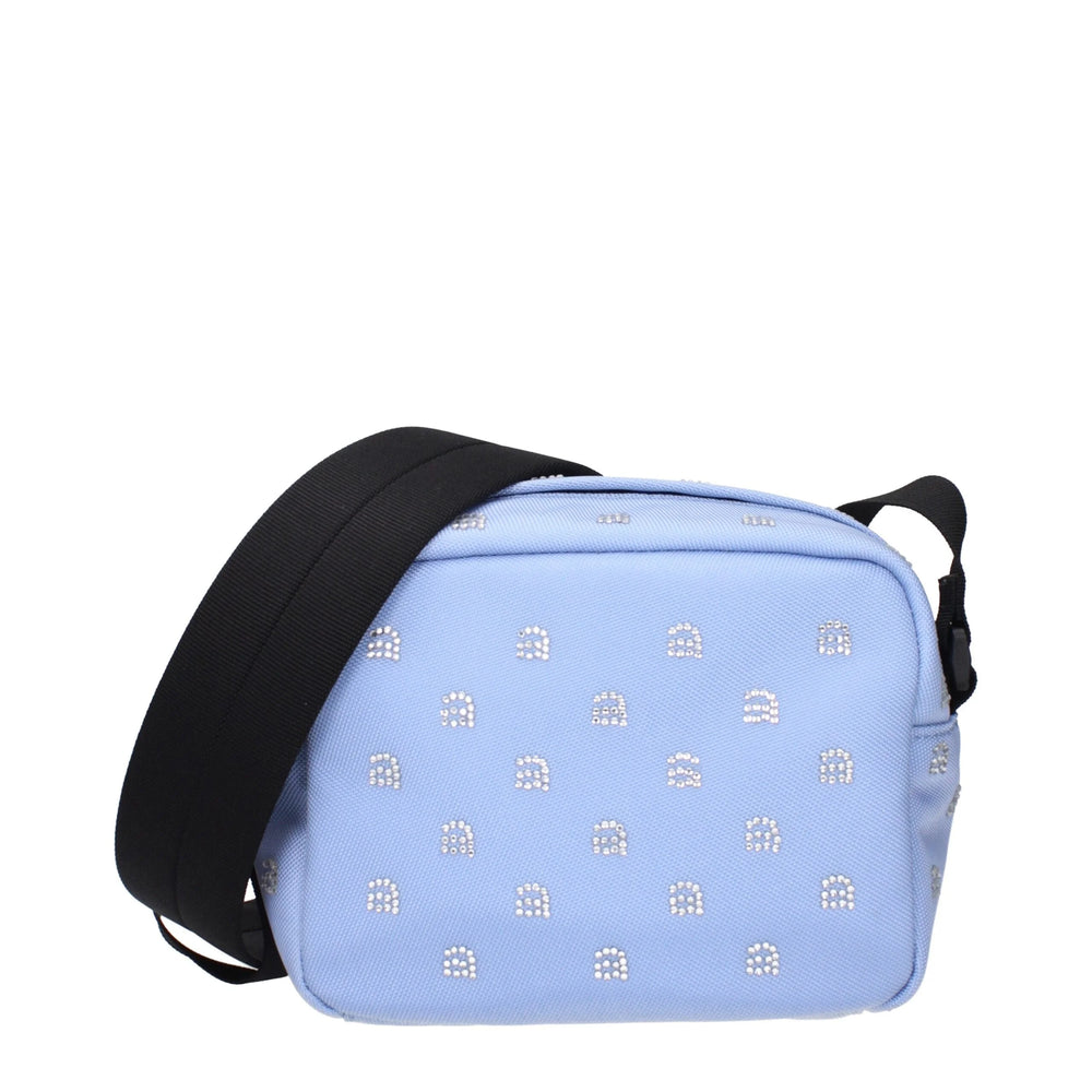 Τσάντα crossbody Alexander Wang σε ανοιχτό μπλε ύφασμα με μεταλλικά στοιχεία σε ασημί απόχρωση και χαρακτηριστική δομημένη σιλουέτα.