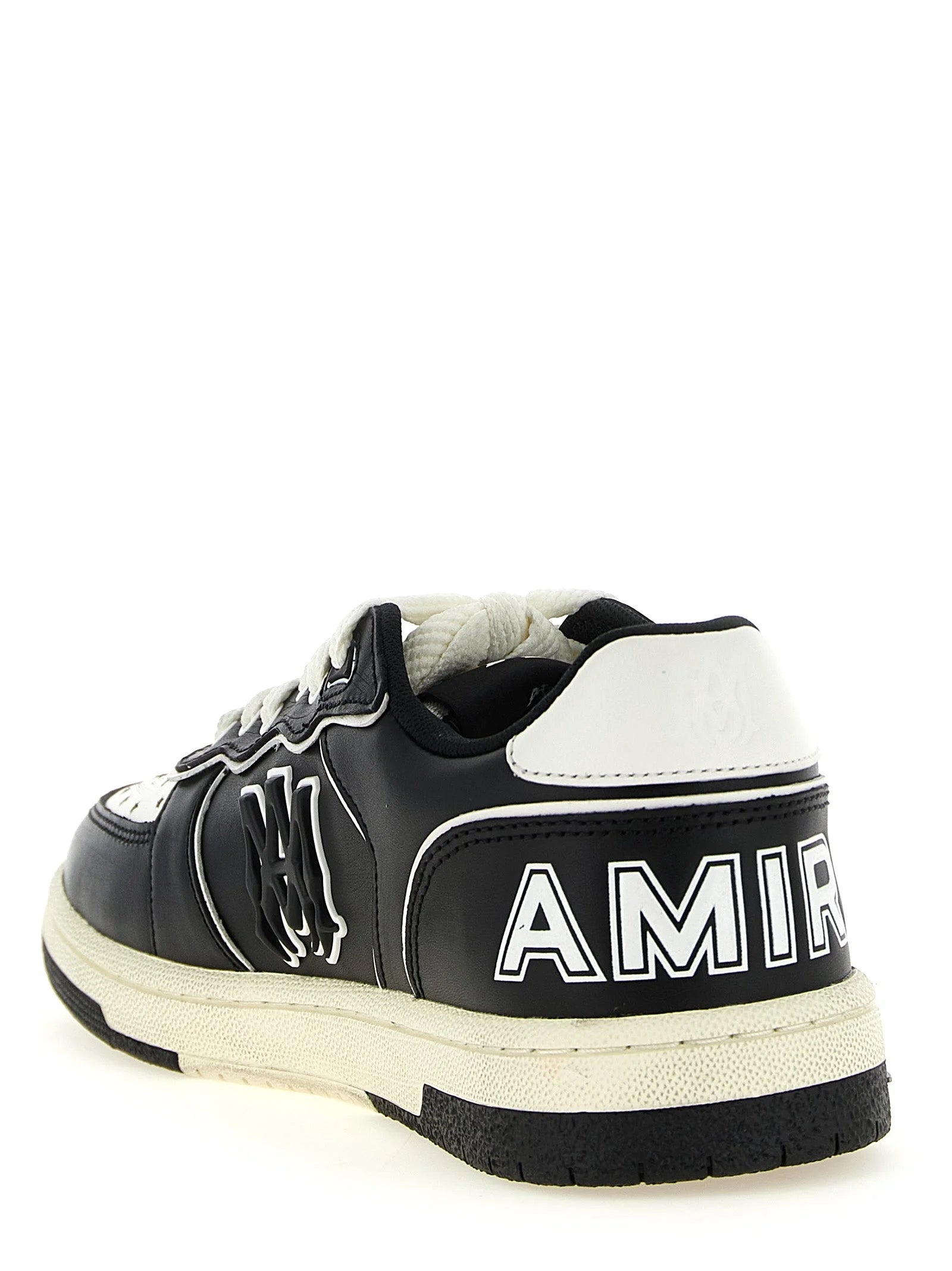 Amiri tvåfärgade låga sneakers i nötläder