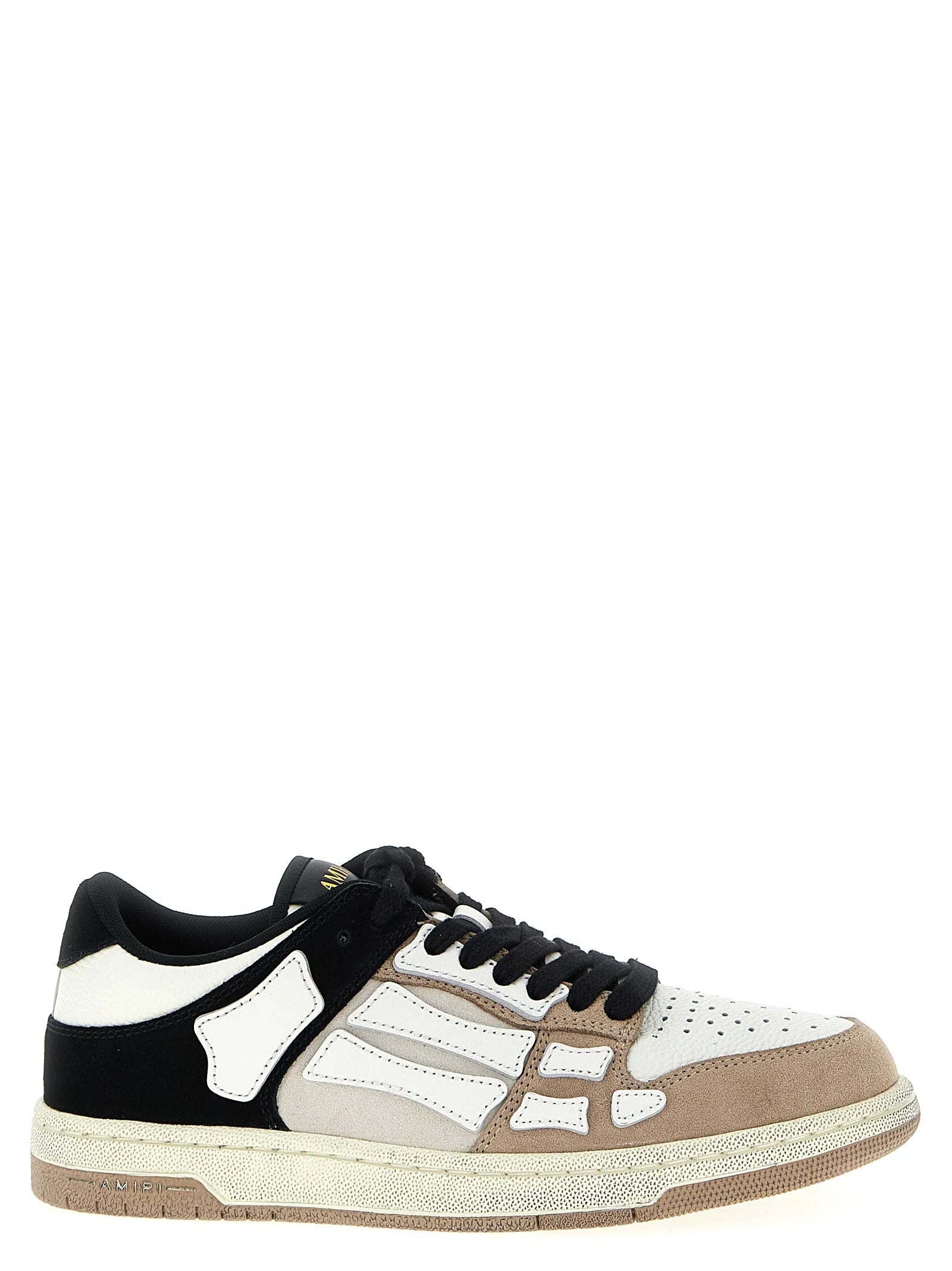 Zapatillas Amiri de diseño bajo en cuero de vaca multicolor, con un diseño panelado refinado y la silueta de lujo característica.