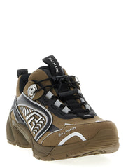 Side profile of Balmain men's athletic sneakers showing the aerodynamic silhouette and layered architectural midsole.