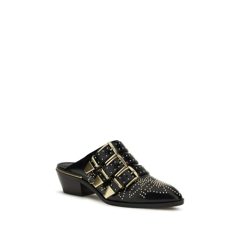Chloé Svarte mules i Bos Taurus-skinn