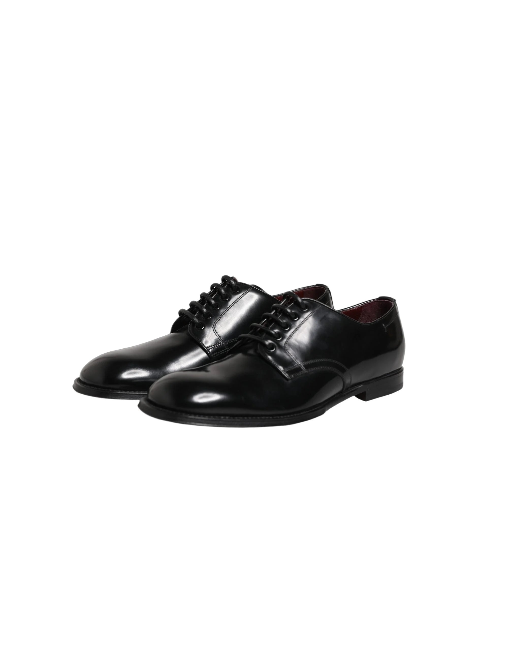Top-down view of black leather Derby shoes by Dolce & Gabbana, showcasing the almond toe and open lacing system.