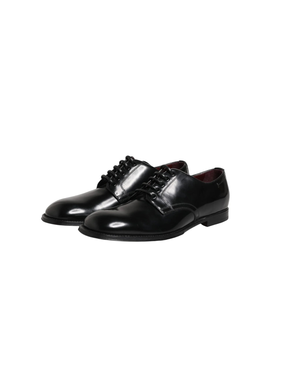 Top-down view of black leather Derby shoes by Dolce & Gabbana, showcasing the almond toe and open lacing system.