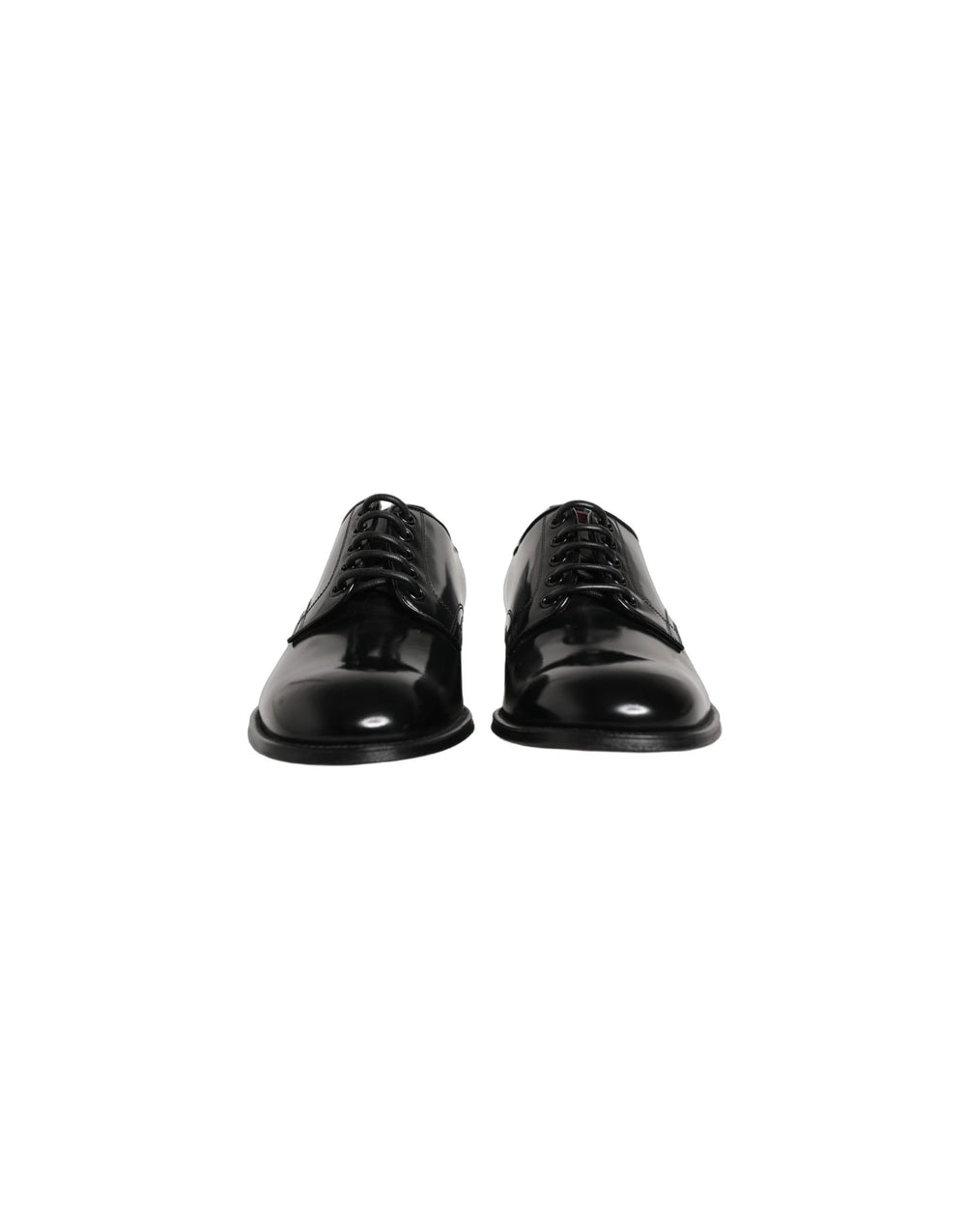 Side profile of Dolce & Gabbana men's black leather Derbies showing the elegant curve and stacked heel construction.
