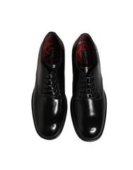 Rear view of Dolce & Gabbana calfskin dress shoes highlighting the reinforced heel counter and precise tonal stitching.