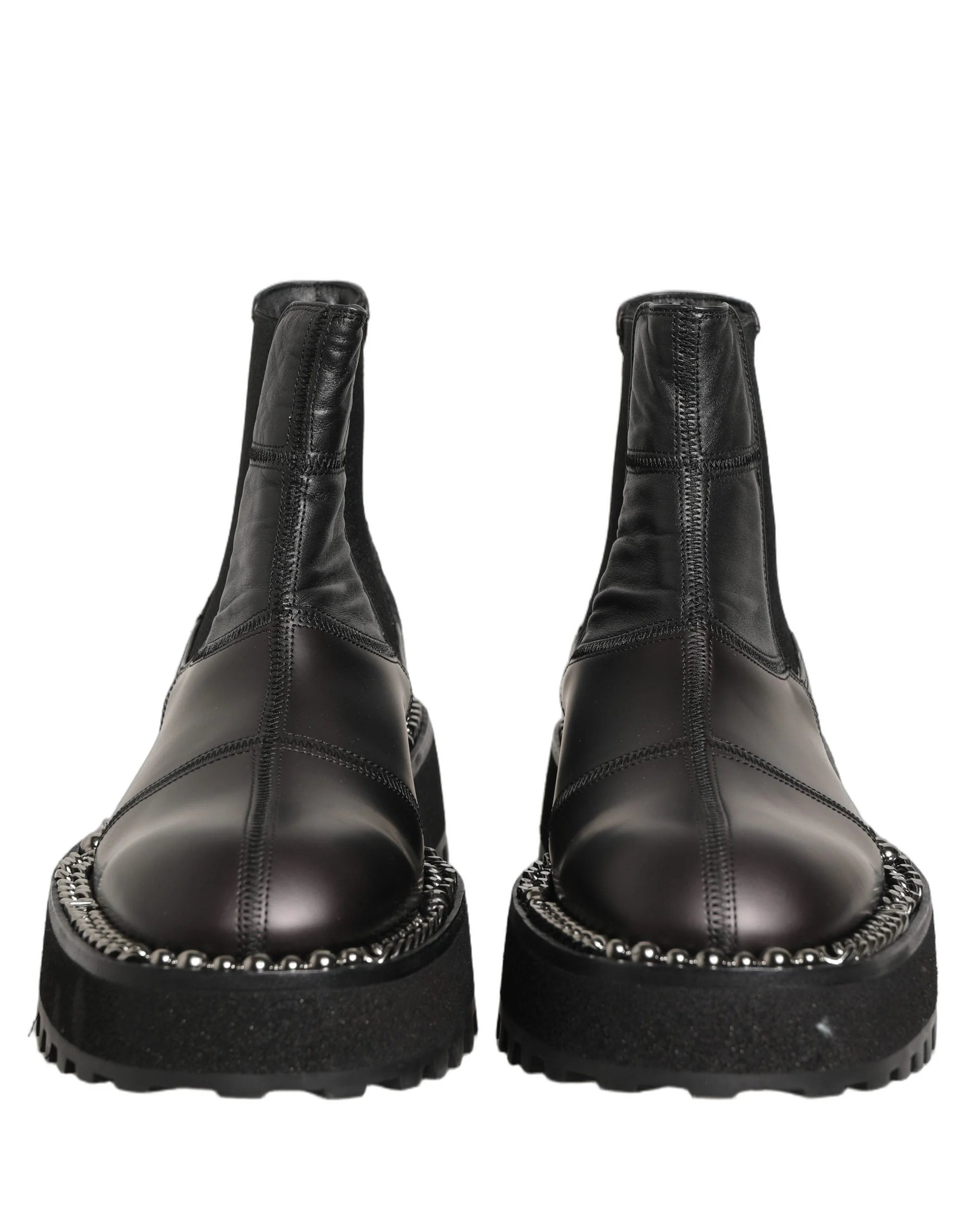 Detail shot of the Dolce & Gabbana branded leather insole and interior lining of the black Chelsea boots.