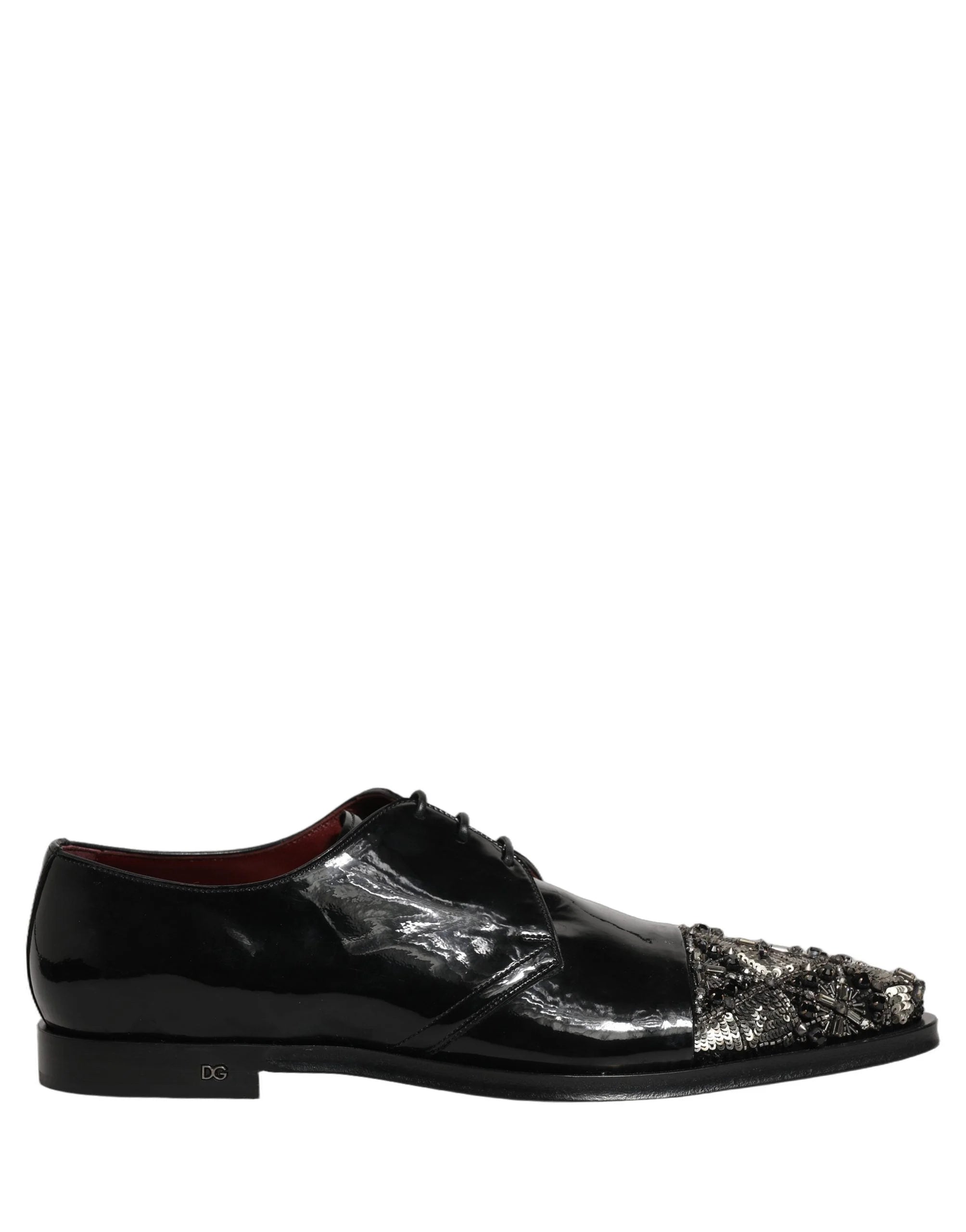 The leather sole of Dolce & Gabbana dress shoes featuring the engraved brand logo and authentic Italian construction.