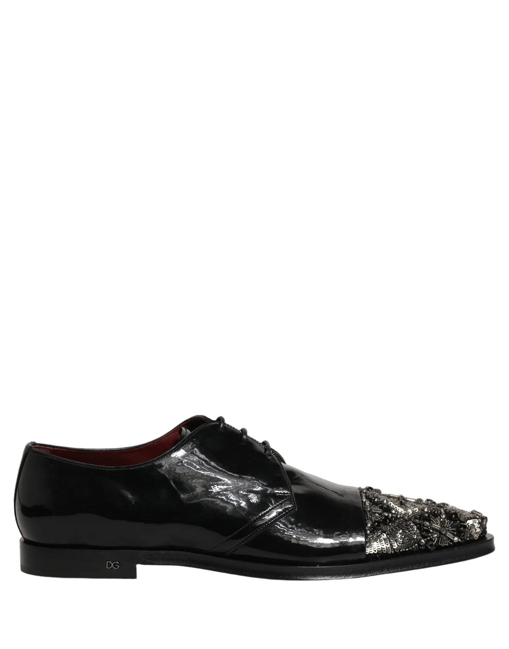 The leather sole of Dolce & Gabbana dress shoes featuring the engraved brand logo and authentic Italian construction.