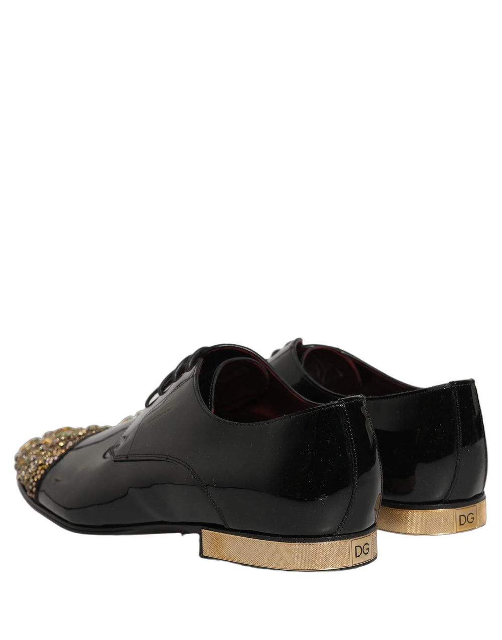 Nærbilde av krystallpynten og fine sømmer på Dolce & Gabbana luksuslærsneakers.