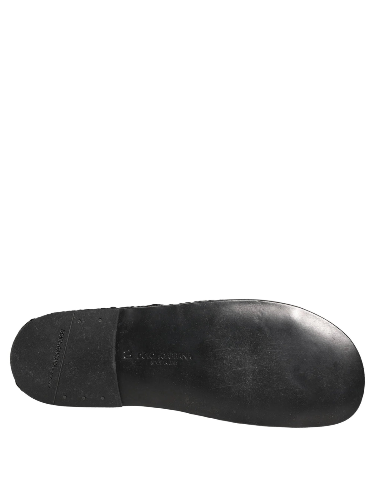 Dolce & Gabbana men's black woven fabric slides featuring a sophisticated textured strap and flat profile.