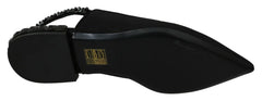 Vue arrière des chaussures plates en soie mélangée noire Dolce & Gabbana mettant en évidence la sangle de talon élastique à brides arrière.
