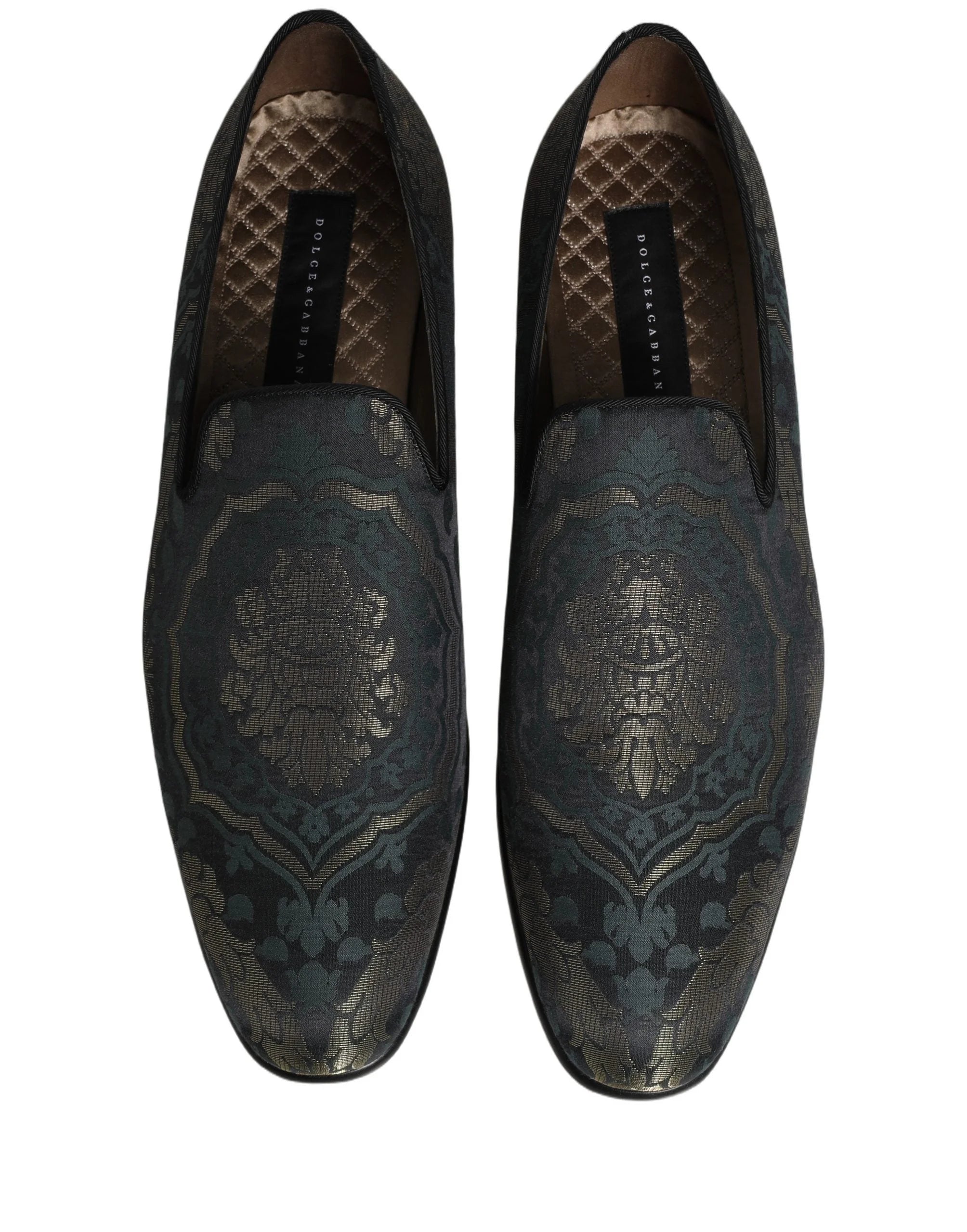 Achterkant van de Dolce & Gabbana-bloemenloafers, waarbij de gestructureerde hielkap en de hoogwaardige lederen afwerking worden benadrukt.