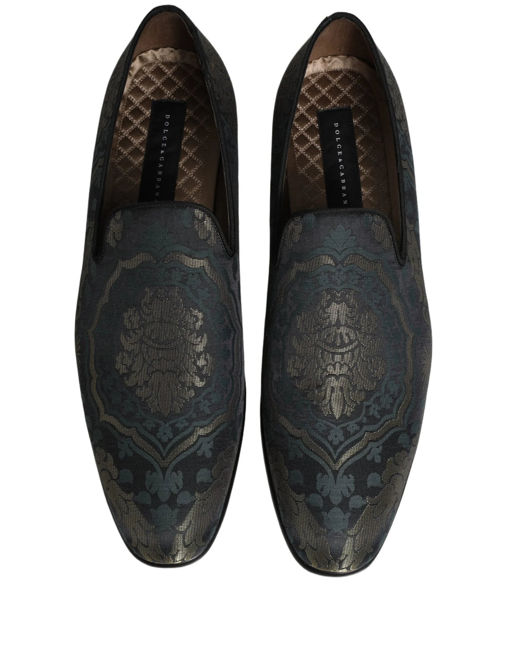 Achterkant van de Dolce & Gabbana-bloemenloafers, waarbij de gestructureerde hielkap en de hoogwaardige lederen afwerking worden benadrukt.