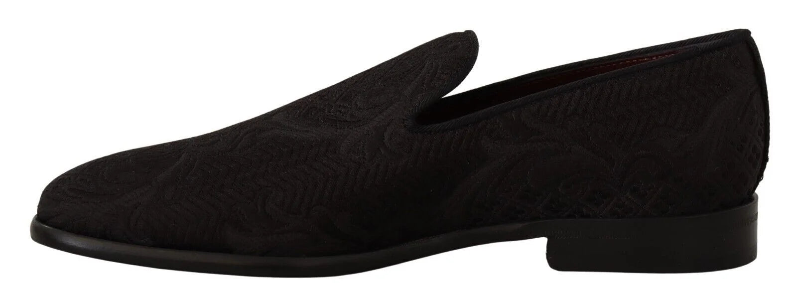 Close-up of the ornate floral brocade pattern on Dolce & Gabbana slippers, crafted from a rich viscose and silk blend.