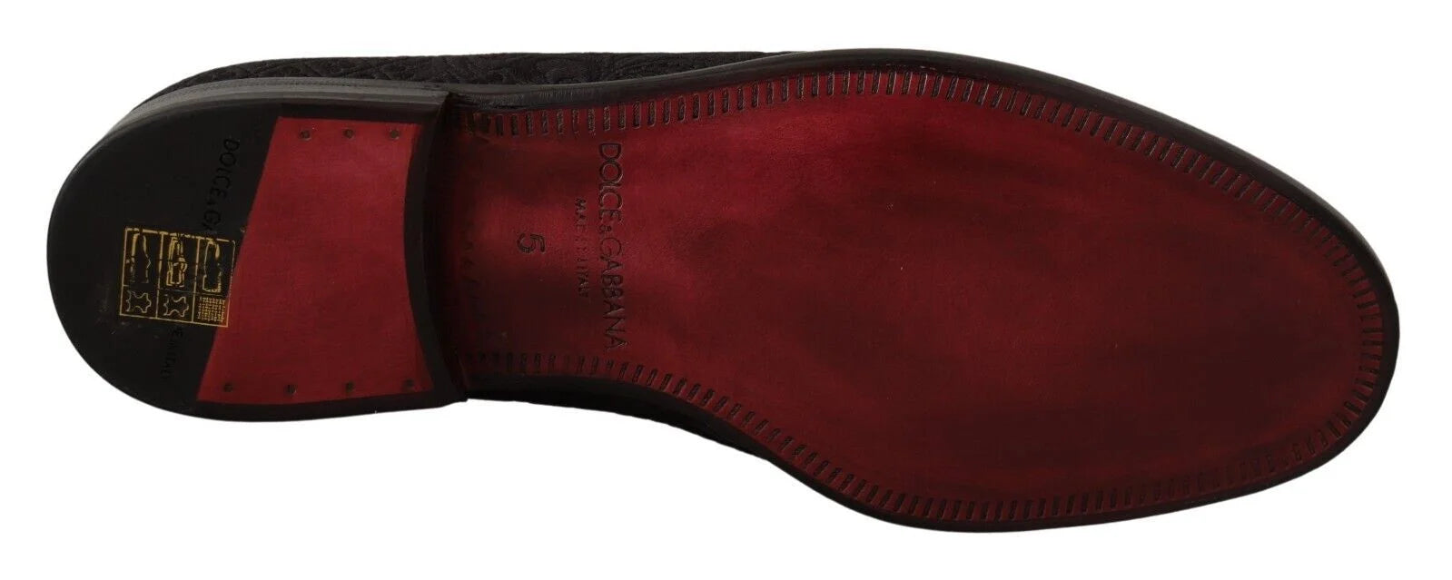 Detailed shot of the leather sole and craftsmanship of these Italian-made Dolce & Gabbana evening loafers.