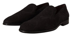 Rear view of the Dolce & Gabbana floral slippers highlighting the seamless heel construction and textured fabric.