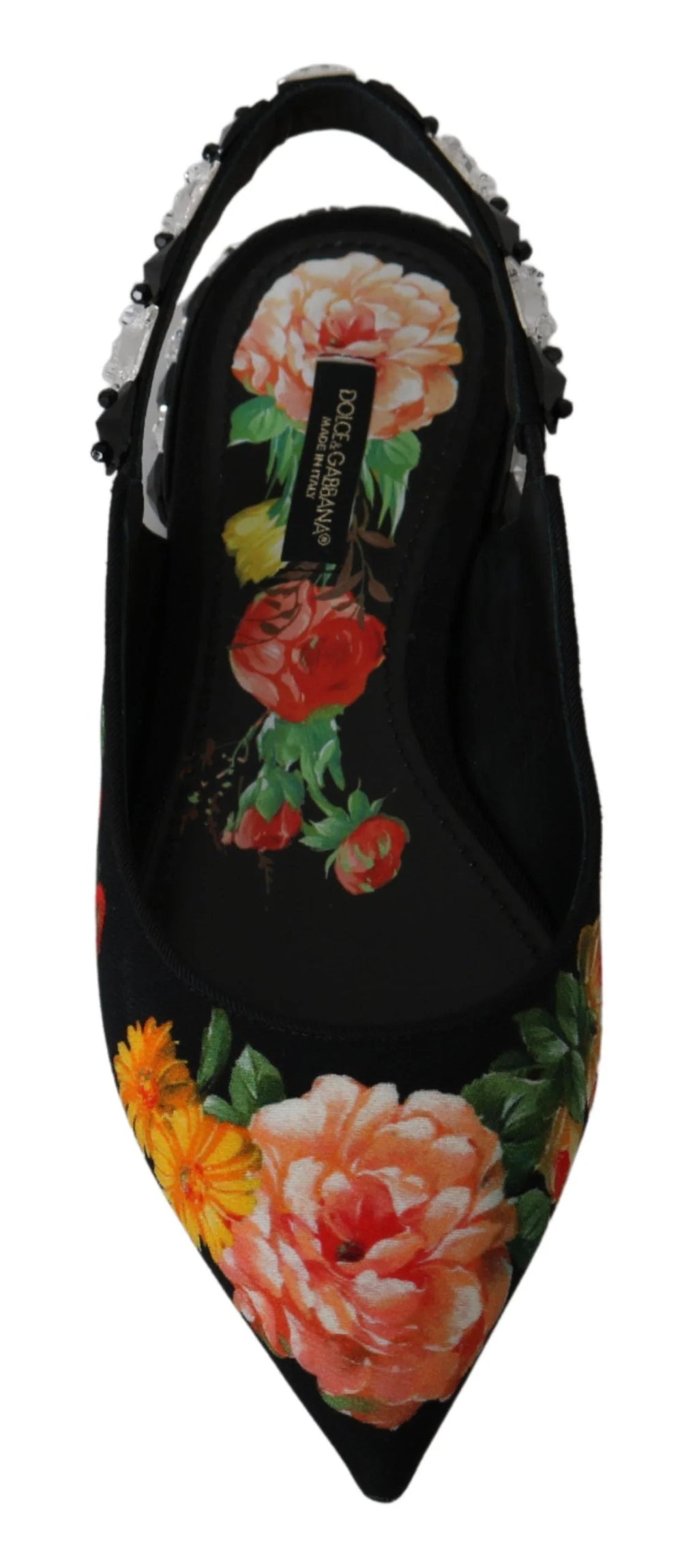 Ylhäältä kuvattu Dolce & Gabbana -mustat ballerinat, jotka korostavat symmetristä kristallikukka-asetelmaa terävässä kärjessä.