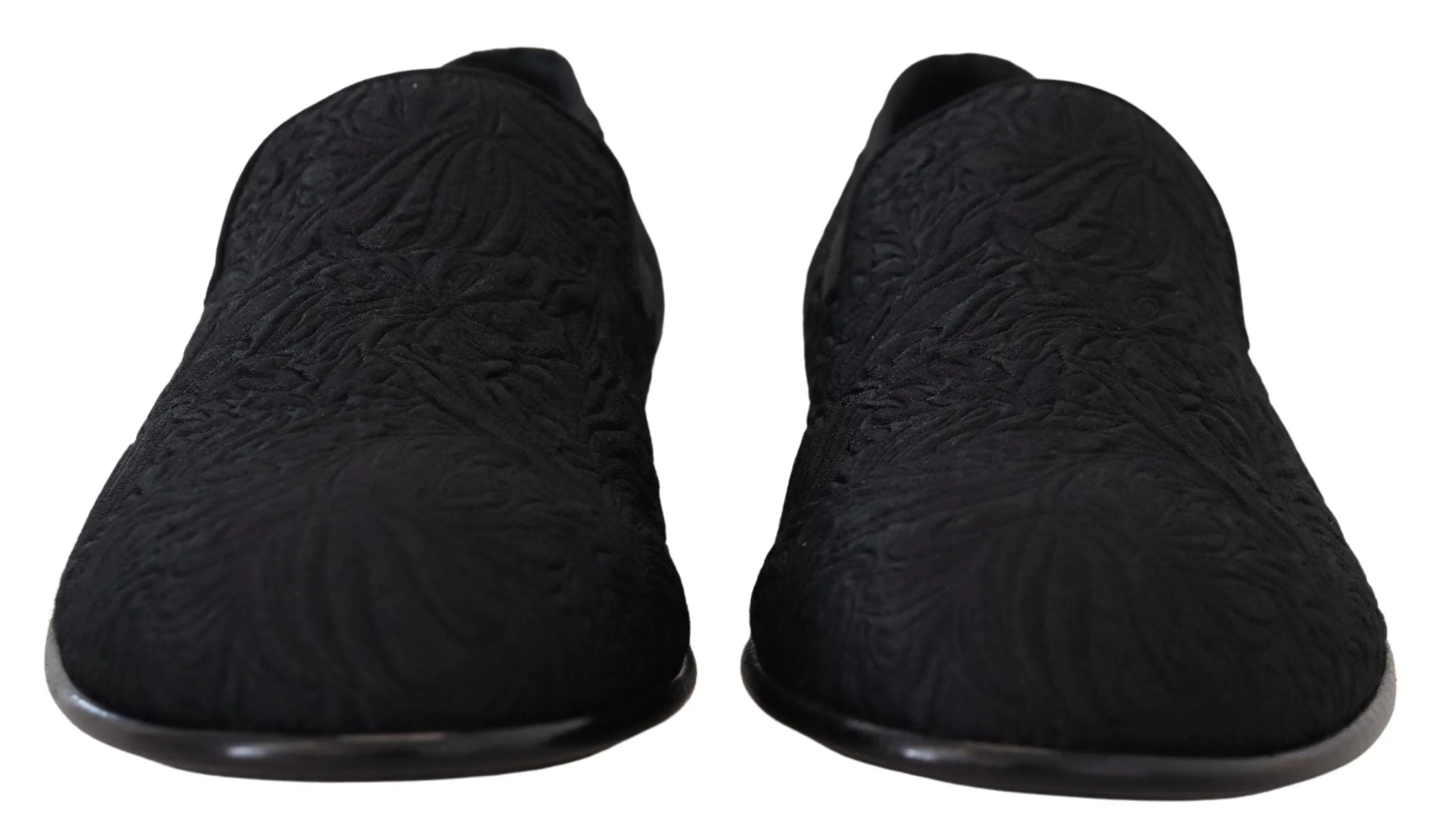 Rear view of the Dolce & Gabbana floral slippers highlighting the structured heel and premium black cotton-silk fabric.