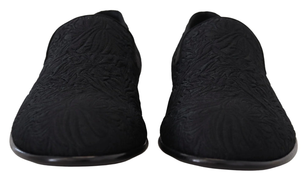 Rear view of the Dolce & Gabbana floral slippers highlighting the structured heel and premium black cotton-silk fabric.