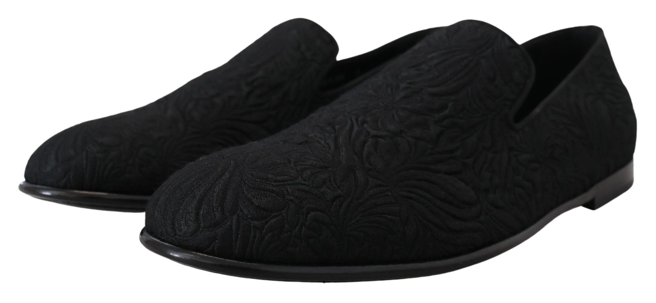 Top-down view of Dolce & Gabbana formal shoes showcasing the intricate floral jacquard pattern and quilted inner lining.