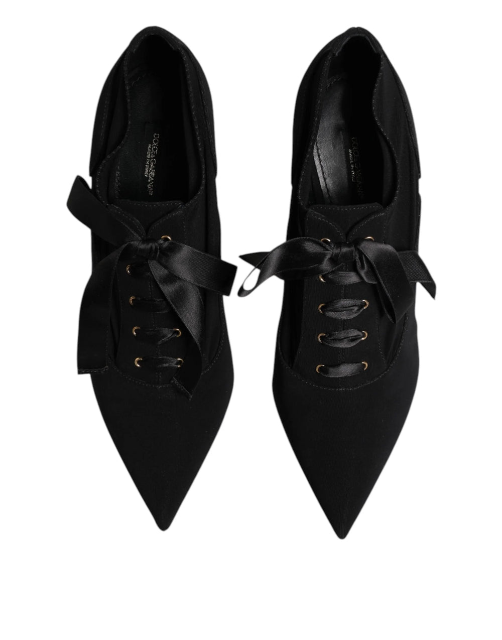 Side profile of Dolce & Gabbana black stilettos showing the sleek 10 cm heel and refined viscose-blend texture.