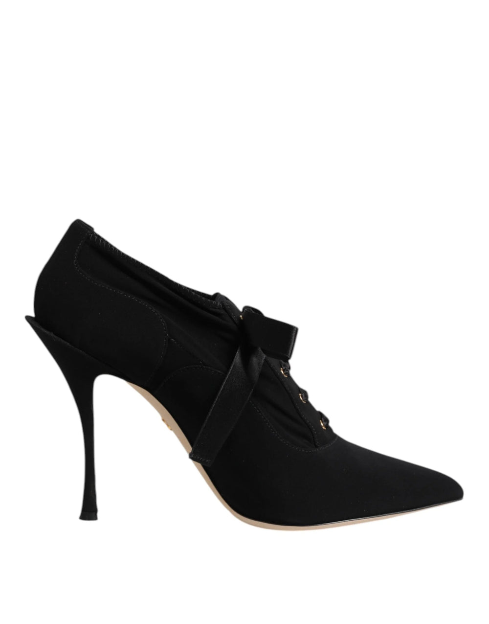 Detail shot of the adjustable ankle ties on these Dolce & Gabbana pumps, showcasing the heritage craftsmanship.