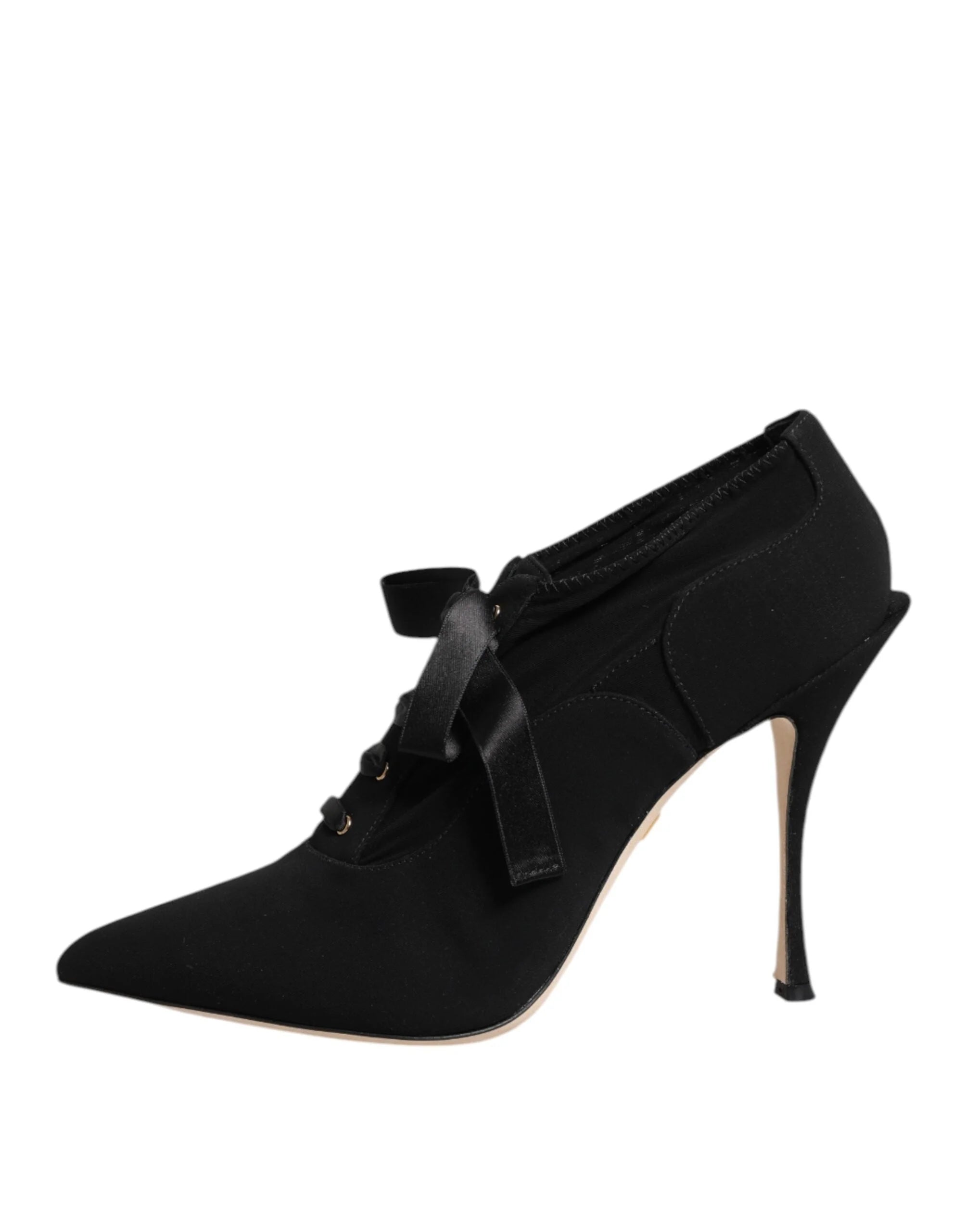 Close-up of the luxurious black viscose fabric and precision stitching on the Dolce & Gabbana lace-up stiletto.