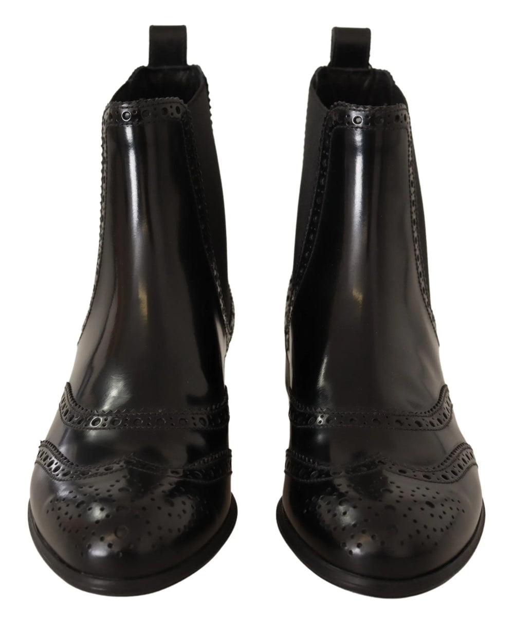 The durable sole and under-side construction of the Dolce & Gabbana women's black leather ankle-high boots.