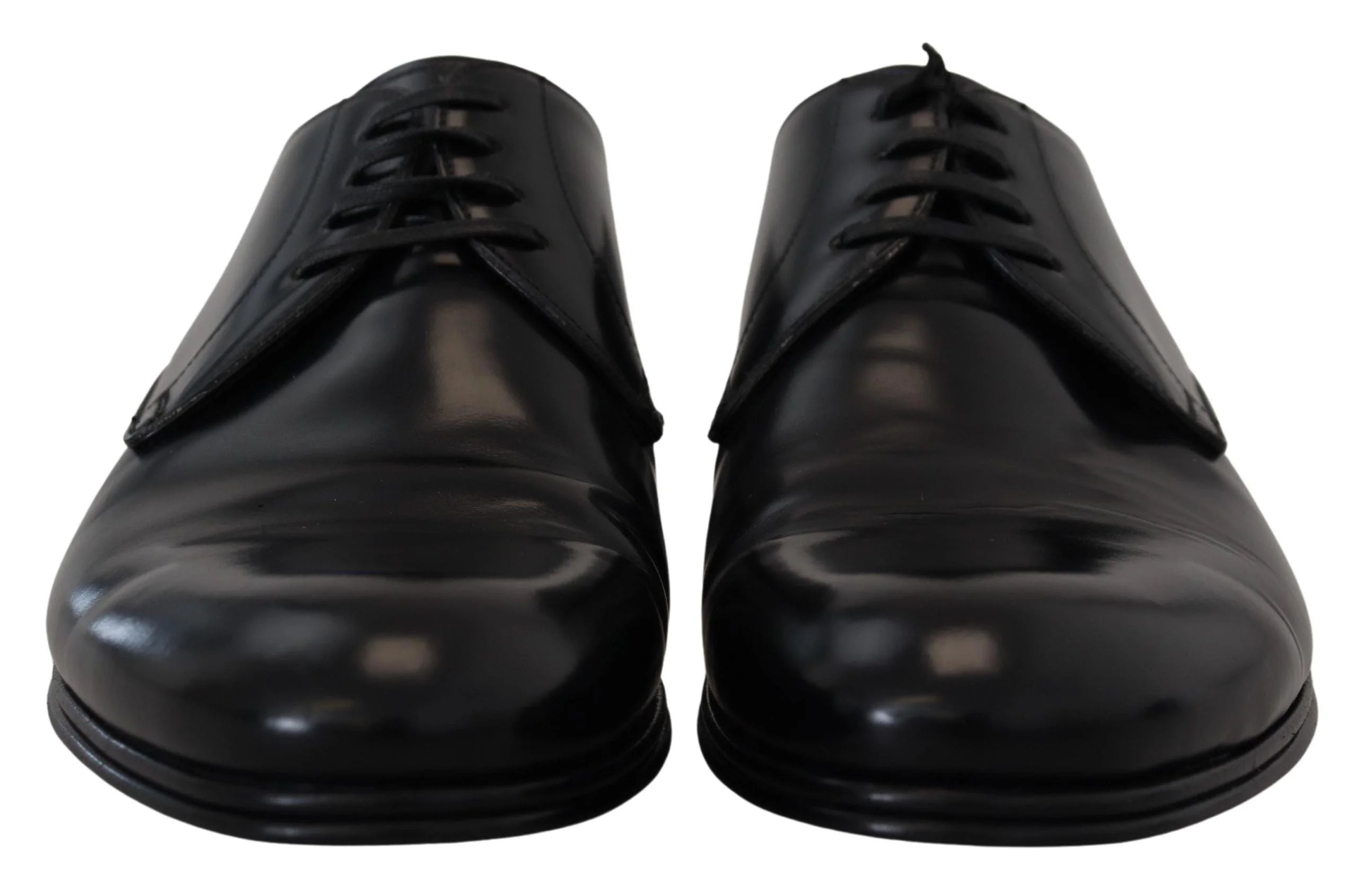 Priveliște de sus a pantofilor formali din piele neagră de la Dolce & Gabbana, cu șireturi tonale și un vârf migdalat rafinat.