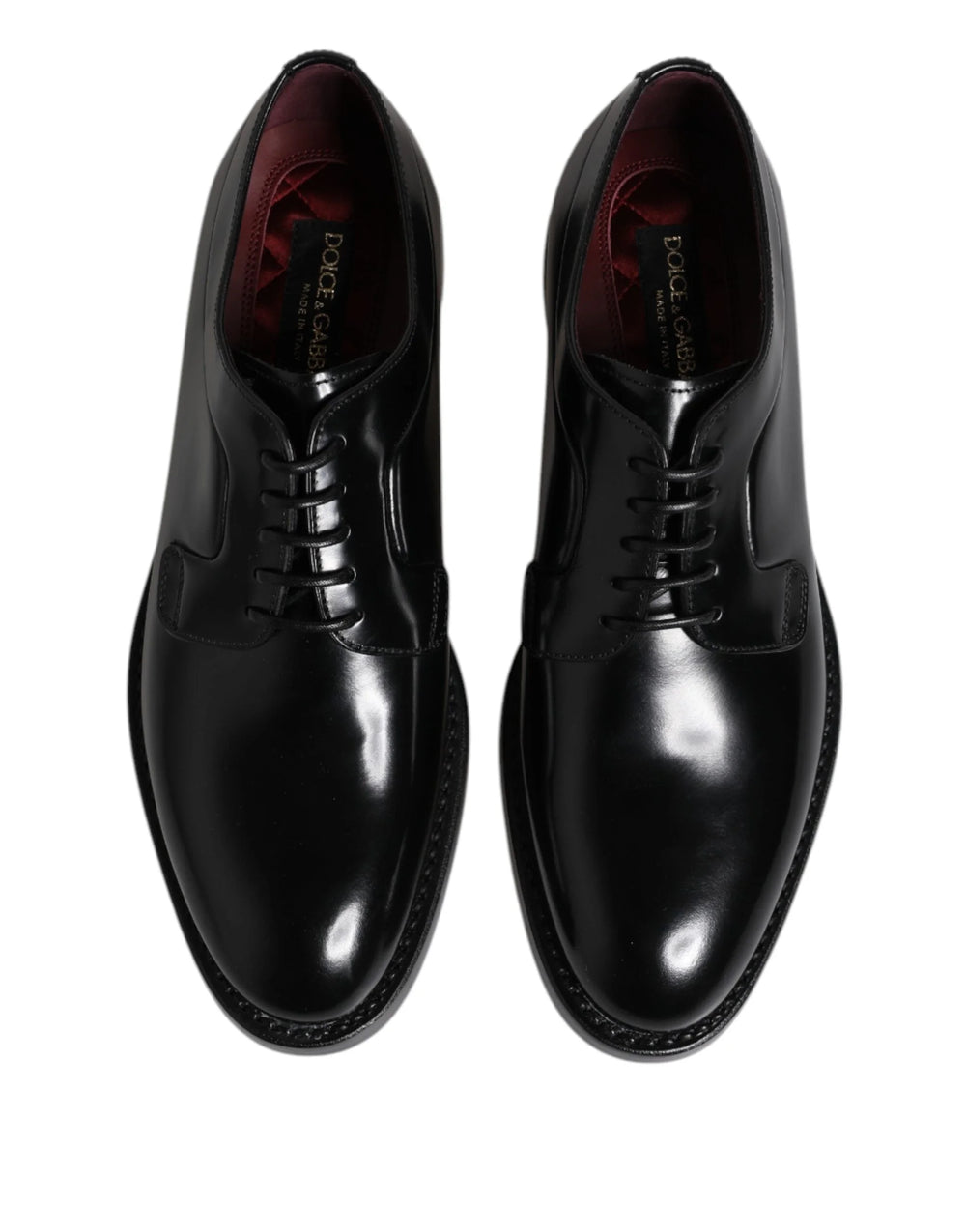 Profil lateral al pantofilor Derby negri Dolce & Gabbana, care prezintă finisajul lucios și călcâiul stratificat.