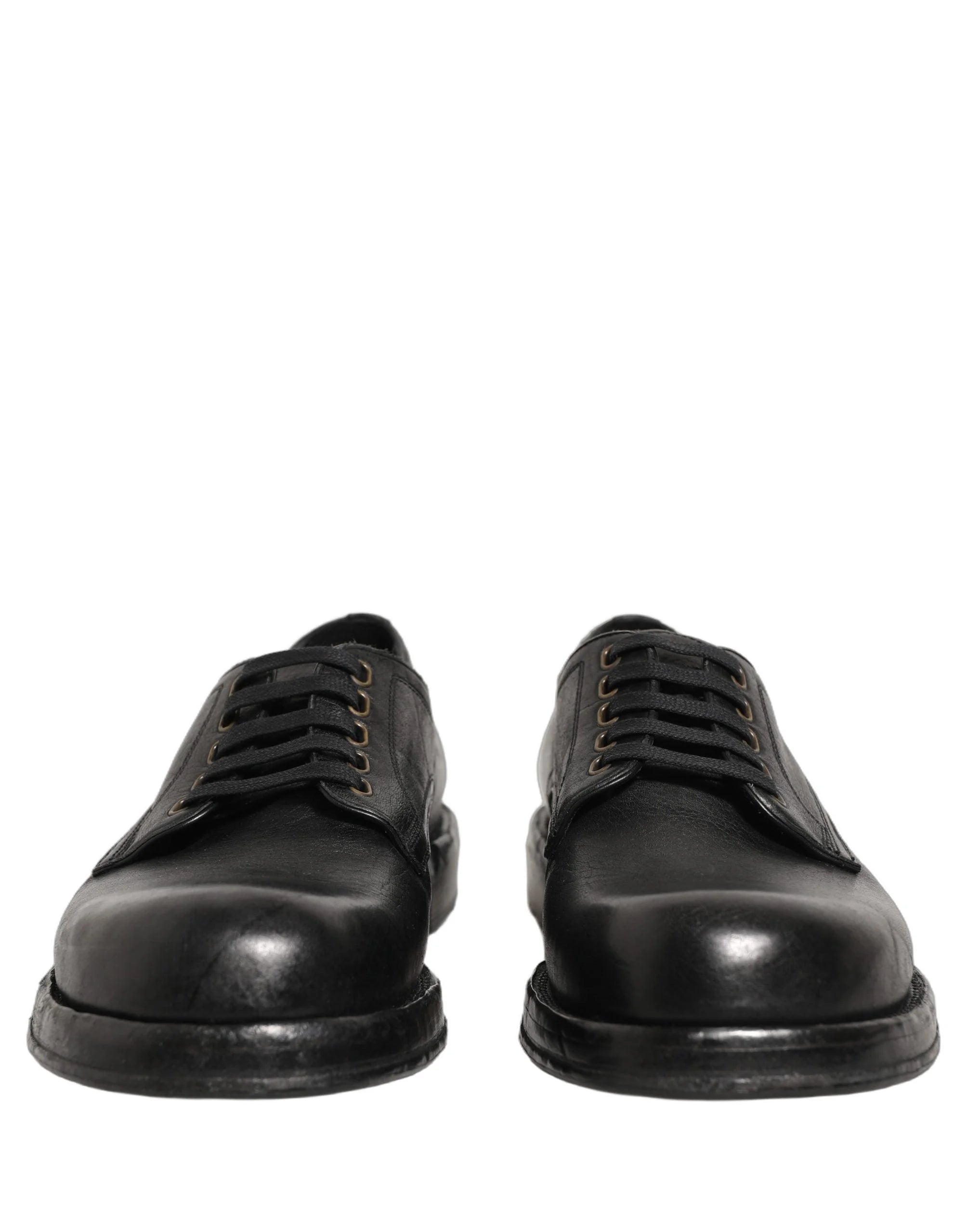 Gedetailleerd beeld van de duurzame lederen zool en hielconstructie op Dolce & Gabbana luxe dress schoenen.