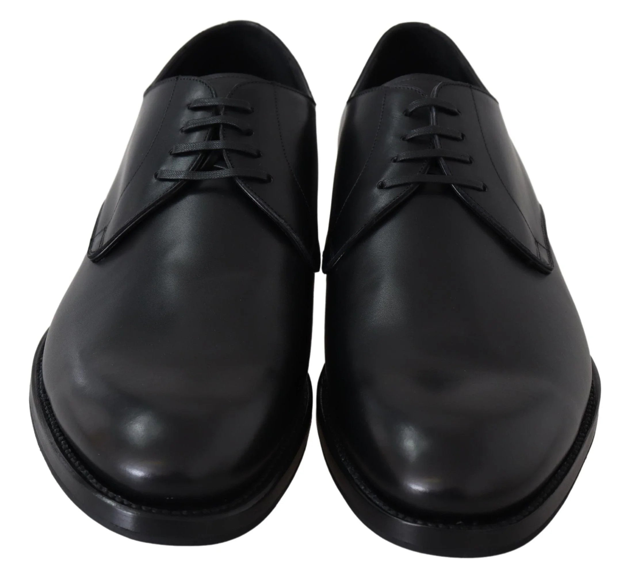 Side profile of Dolce & Gabbana black leather lace-up formal shoes showing the refined silhouette and stacked heel.