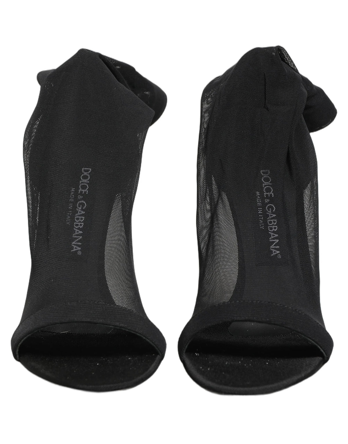 מגפי קרסול בסגנון גרבי מניילון שחור של דולצ'ה וגבאנה הכוללים קצה חד ומעודן ורגל סטילטו דקיקה.