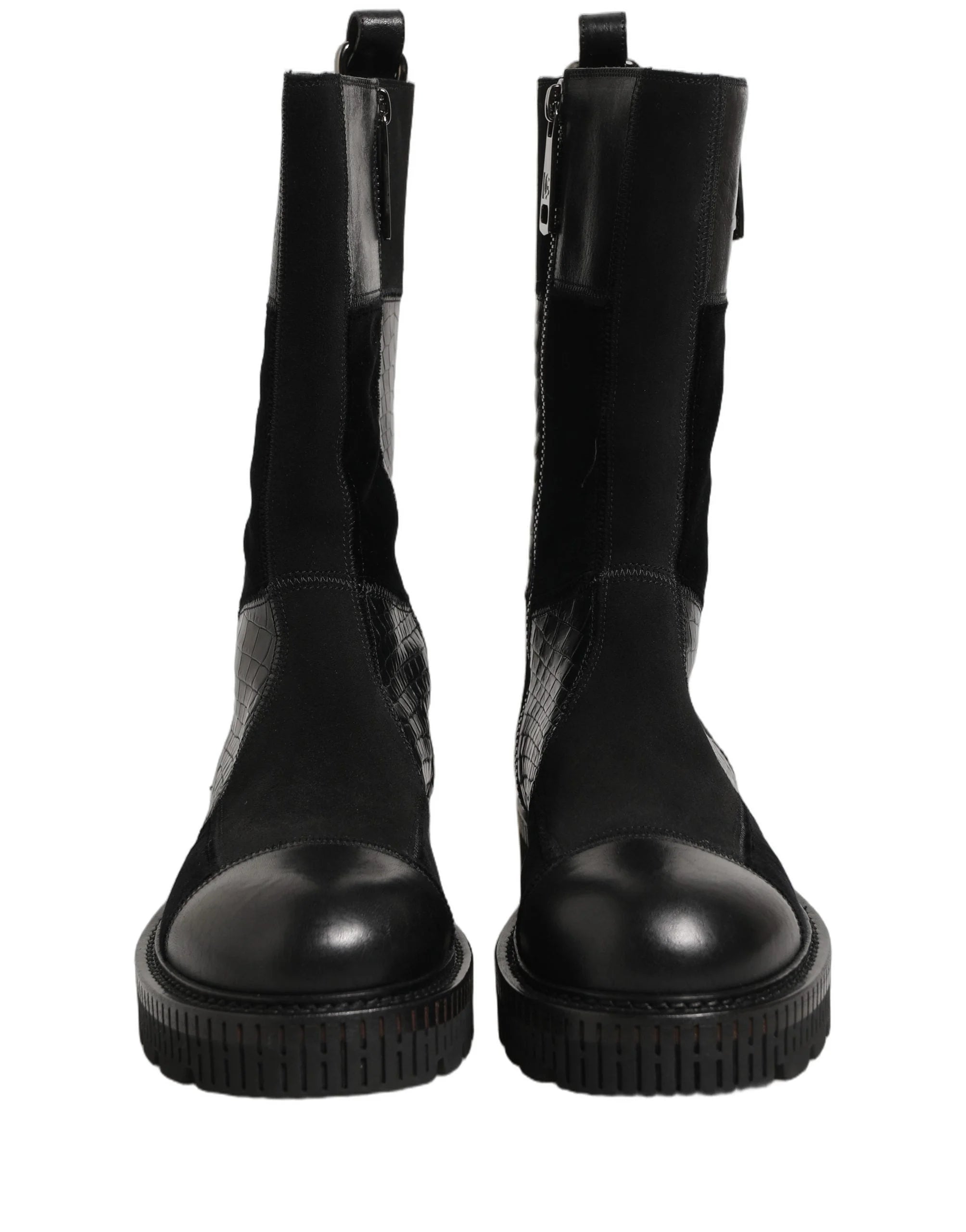 Såledetalj av Dolce & Gabbana skinnstøvler, som illustrerer det høykvalitets håndverket og italienske tradisjonen.