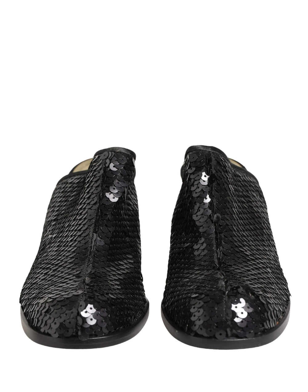Dolce & Gabbana black sequined mules with pointed toe and elegant mid-heel, front view showcasing shimmering texture.