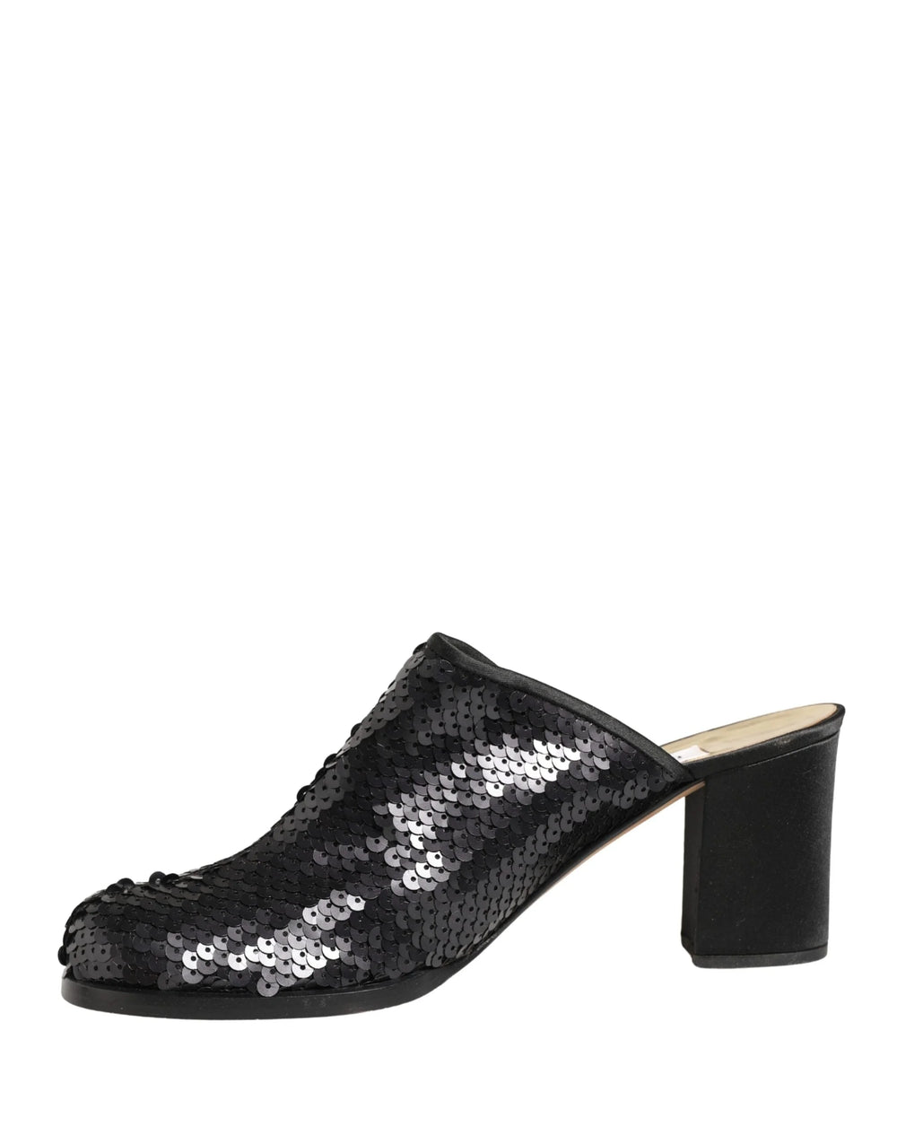 Top-down view of Dolce & Gabbana luxury mules, revealing the branded leather insole and shimmering sequin embellishments.