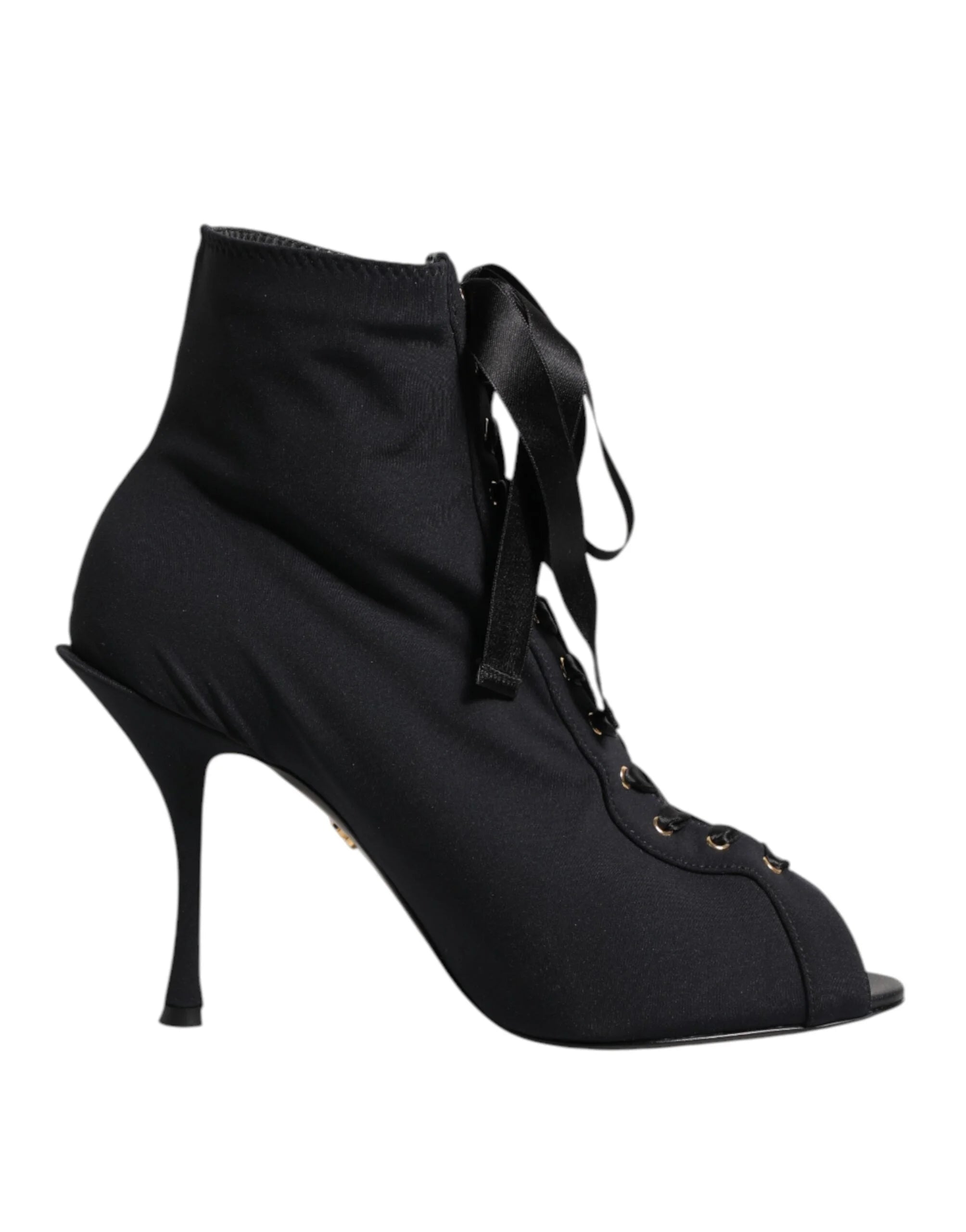 Sole view of Dolce & Gabbana stiletto boots featuring the authentic brand logo and Italian craftsmanship details.