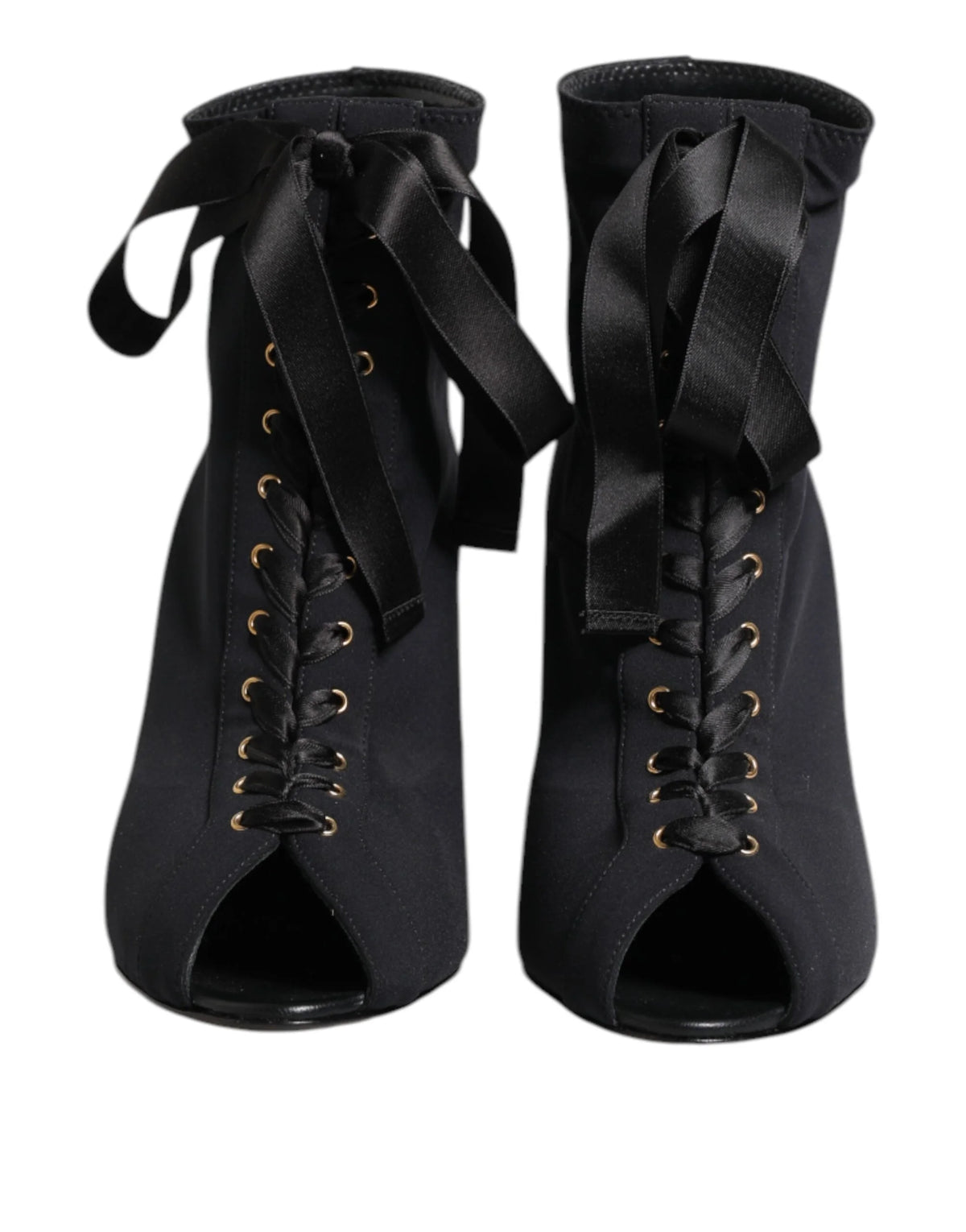 Dolce & Gabbana black leather ankle boots featuring a pointed toe, lace-up front, and elegant stiletto heel.