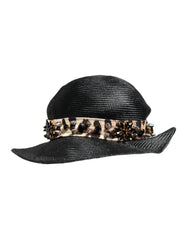 מבט אחורי על כובע השמש השחור של Dolce & Gabbana, המדגיש את האריגה החלקה של שילוב הקש והכותנה היוקרתי.