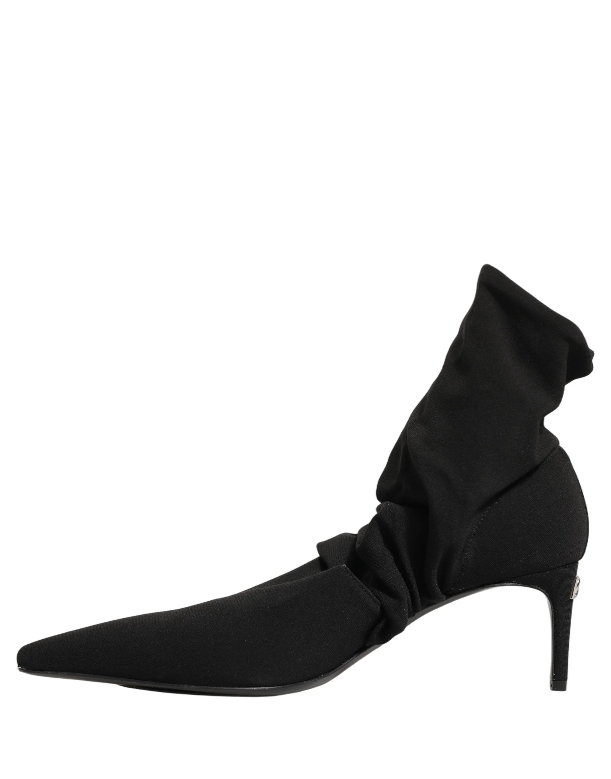 Priveliște din spate a botinelor Dolce & Gabbana din material elastic, evidențiind construcția fără cusături și alinierea verticală a călcâiului.