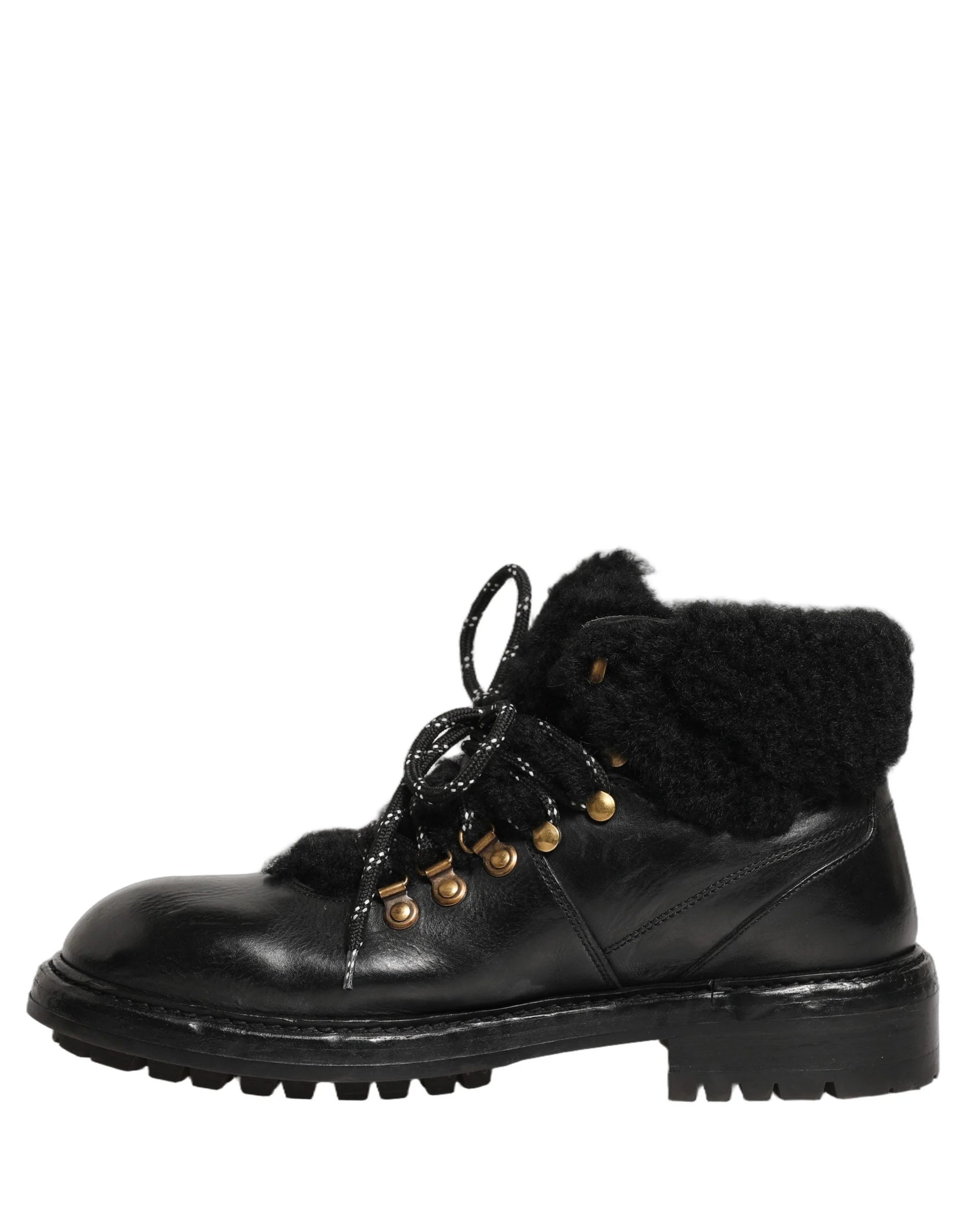 Top-down perspective of the Dolce & Gabbana boots showing the intricate lacing system and luxurious fur collar.