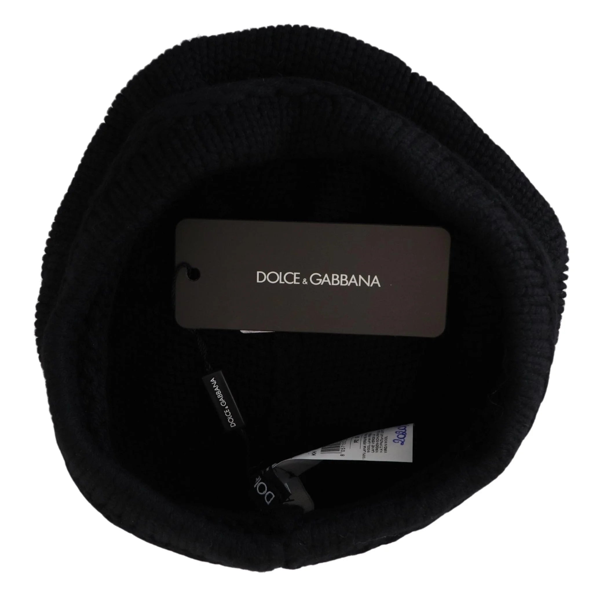 Nahaufnahme des Strickmusters aus 100 % junger Schafwolle auf der luxuriösen Dolce & Gabbana-Wintermütze.