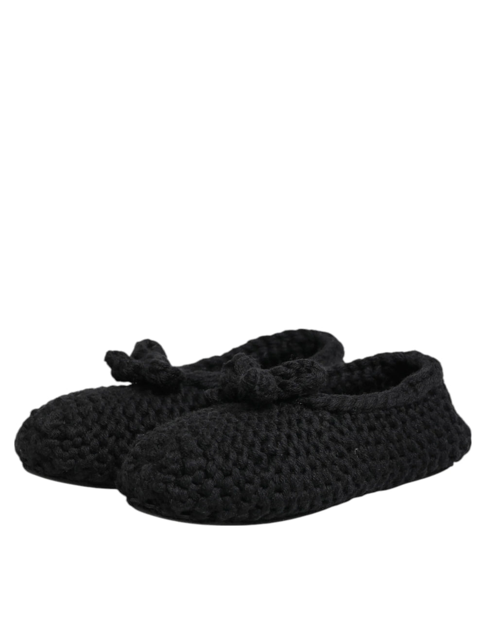 Takakuva mustista villakneepitulleista slip-on-tennareista Dolce & Gabbanalta, jossa on saumaton kantapää ja pehmeä pinta.