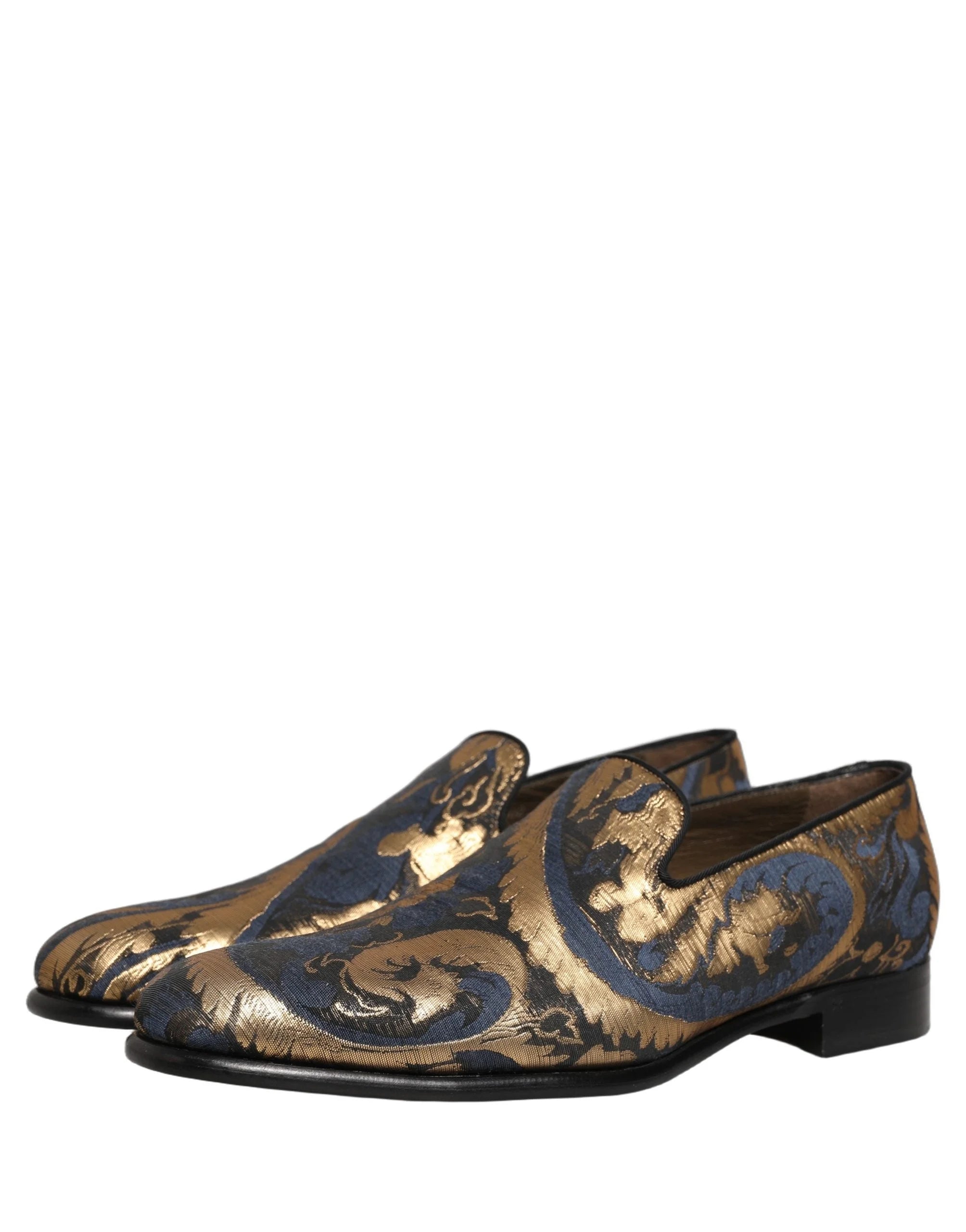 Oversigtsbillede af Dolce & Gabbana blå brokade loafers, der fremhæver den elegante mandelformede tå og læderindlægssål.