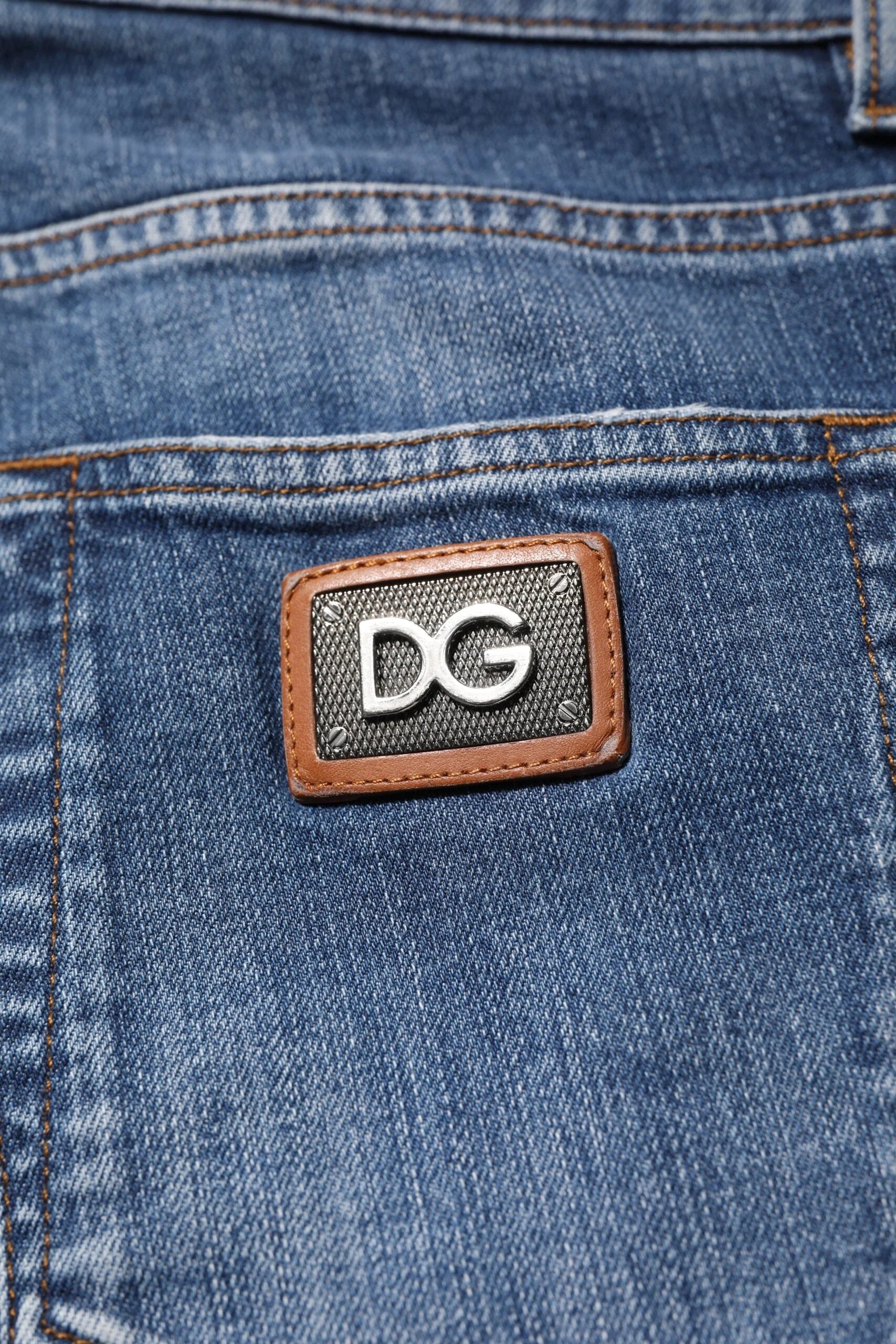 Dolce & Gabbana Blue Cotton Logo Plaque Denim Jeans - IT48 | M