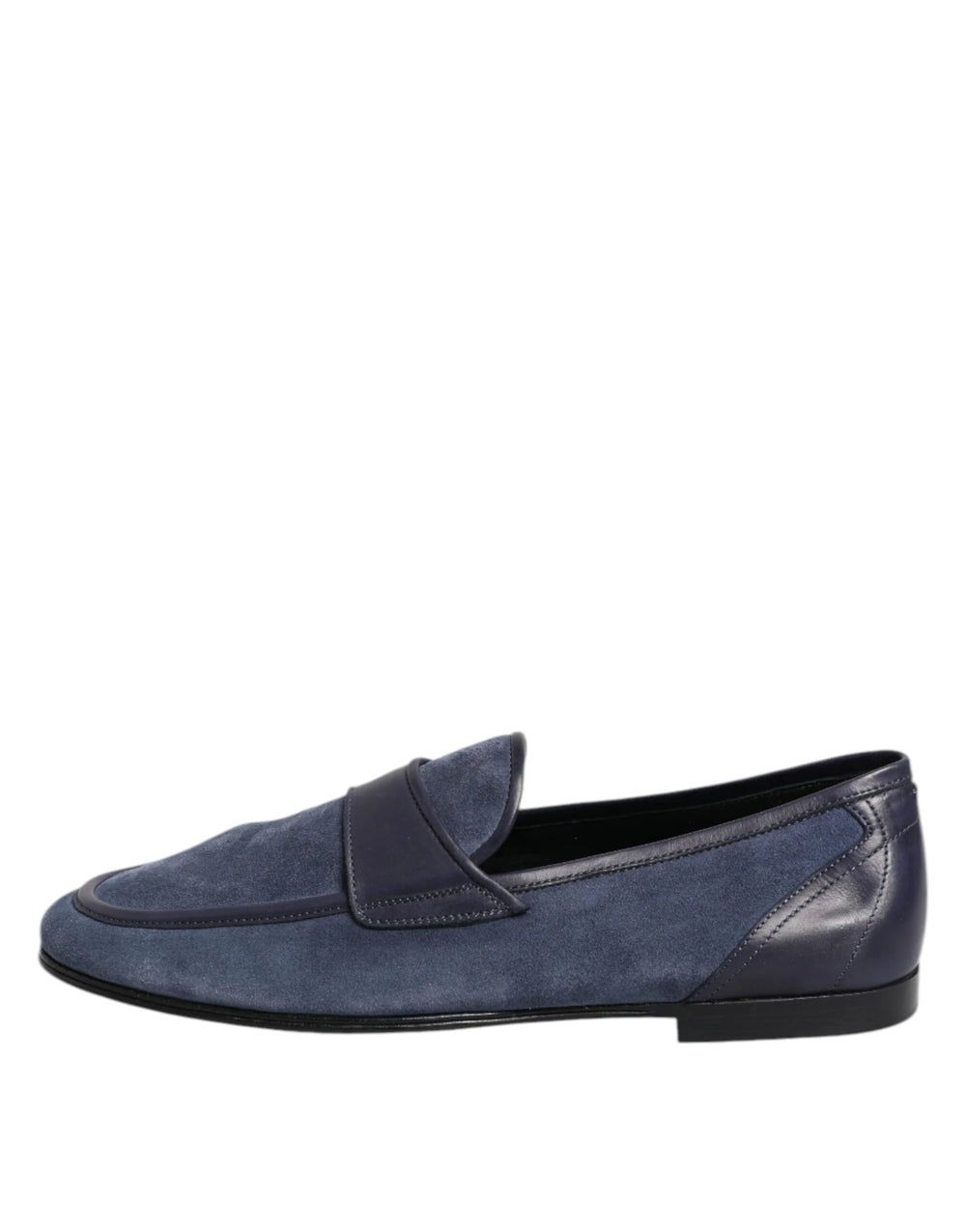 Close-up of the silver-tone Dolce & Gabbana logo plaque on the blue suede upper of these luxury loafers.