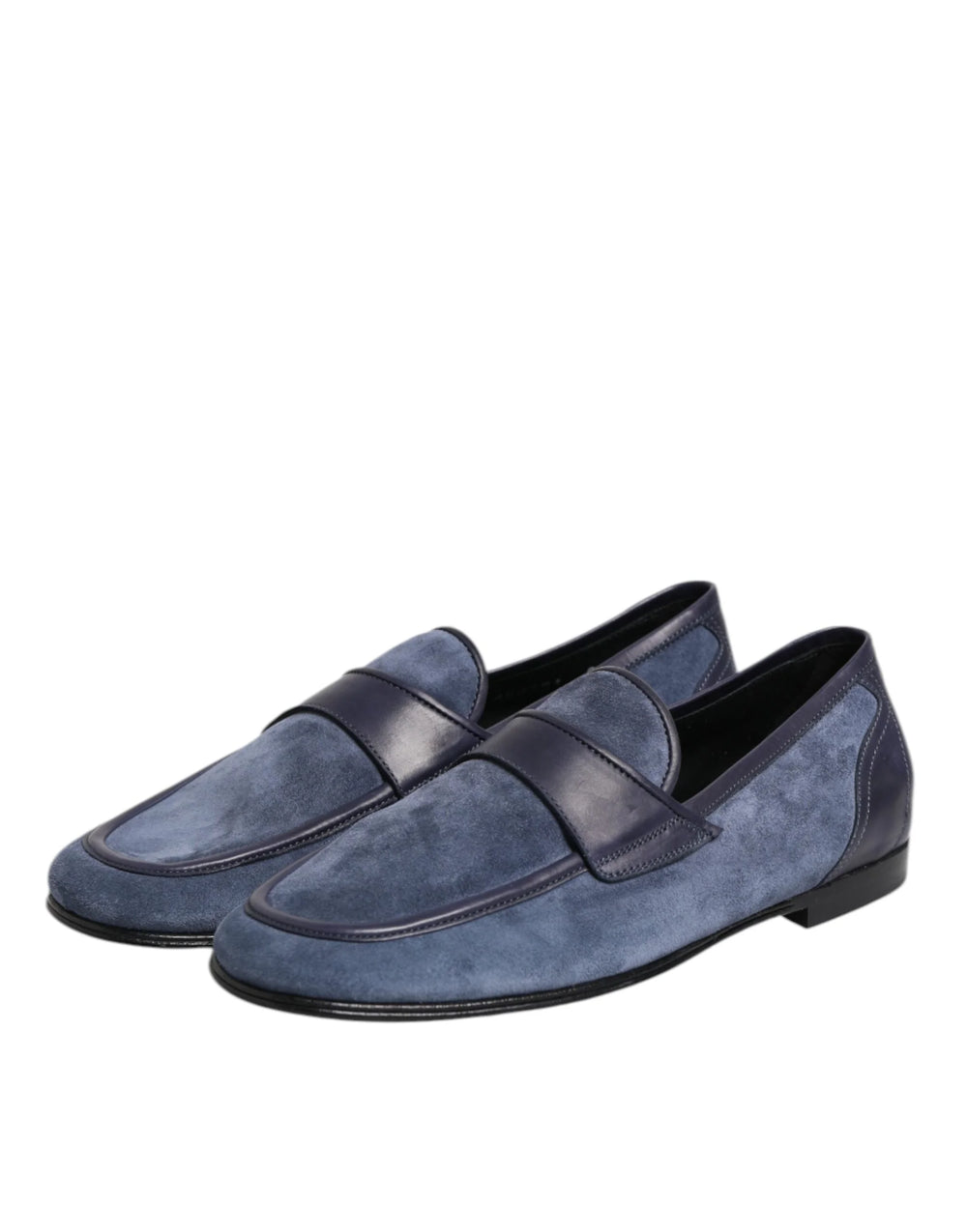 Rear view of Dolce & Gabbana suede loafers showing the structured heel and refined black leather piping.